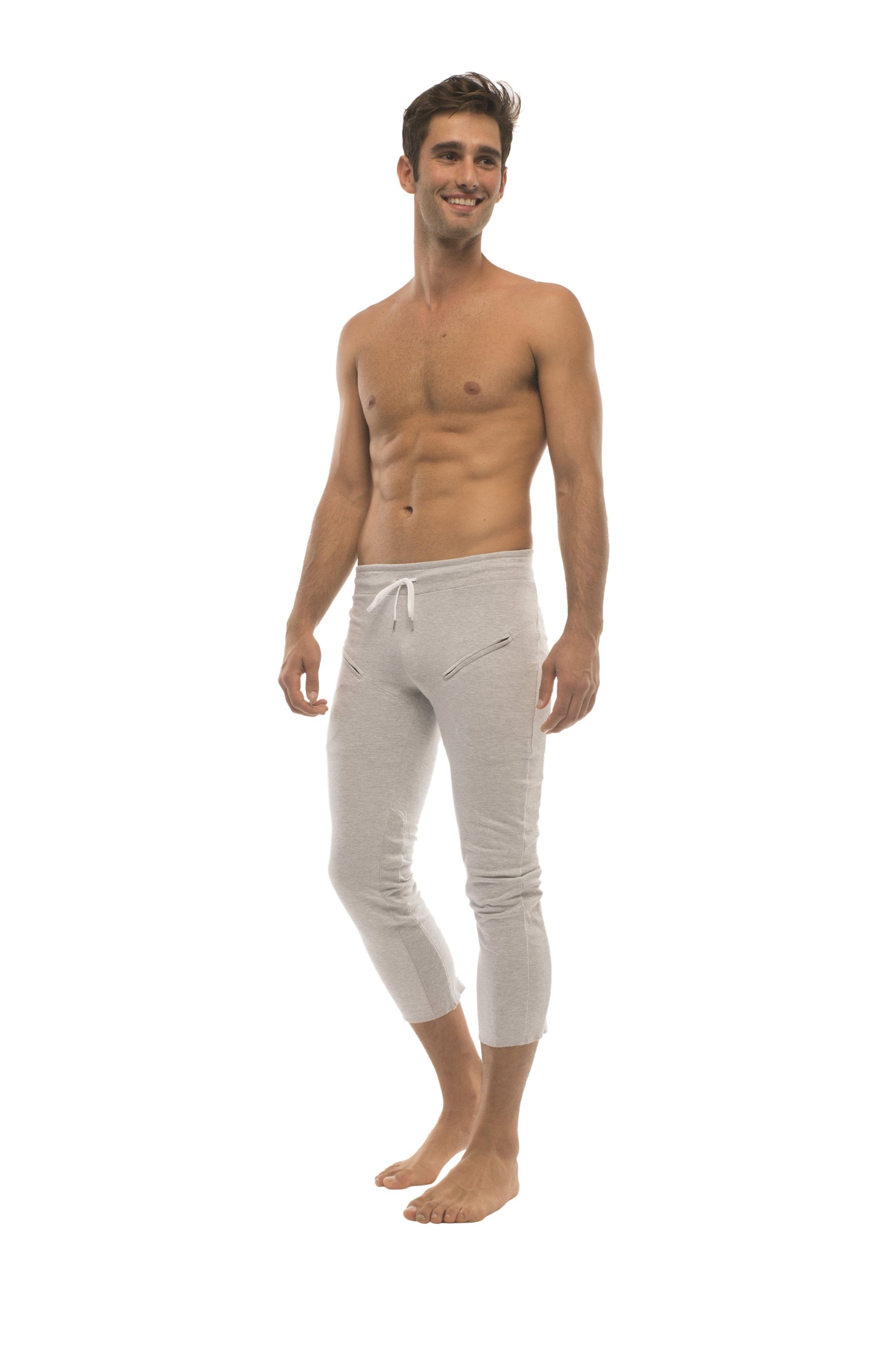 Mens 4/5 solid heather grey capri yoga pants with white cropped joggers featuring drawstring waist and zipper pockets