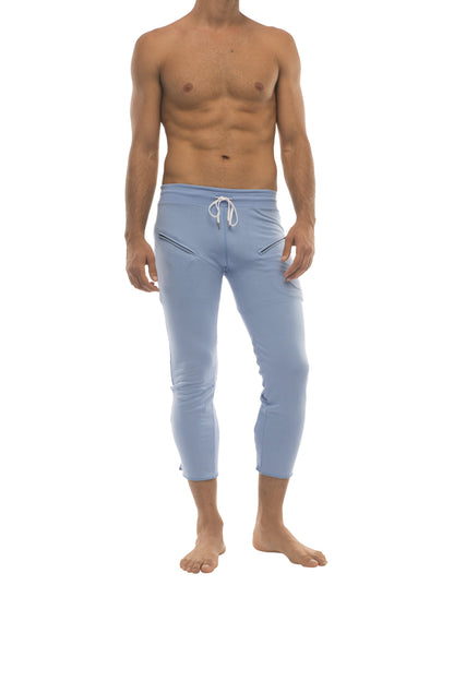 Mens ice blue form-fitting capri yoga pants with white drawstring waistband and side zipper pockets