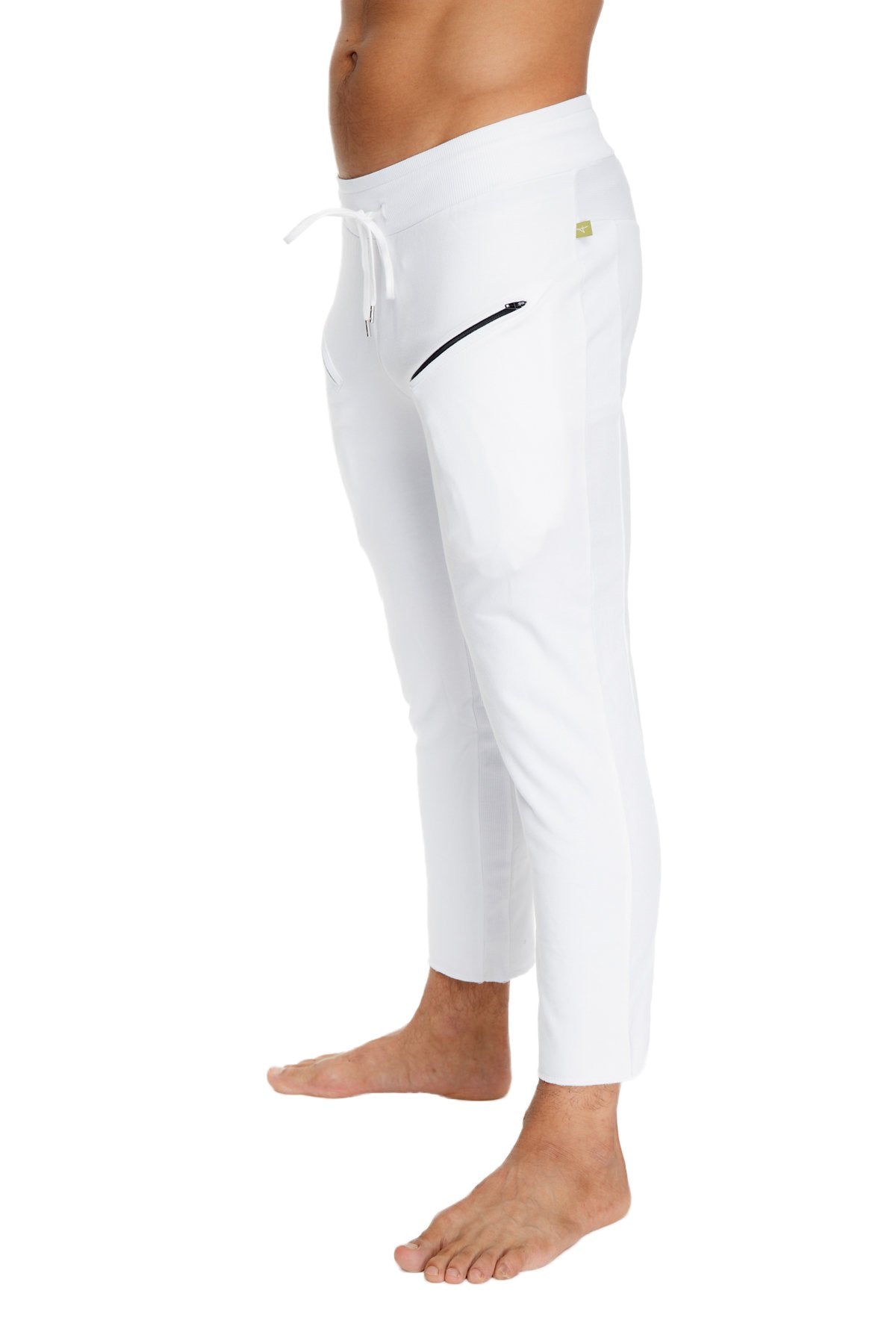 Mens white athletic joggers with a drawstring waistband and black zipper side pocket for yoga and casual wear