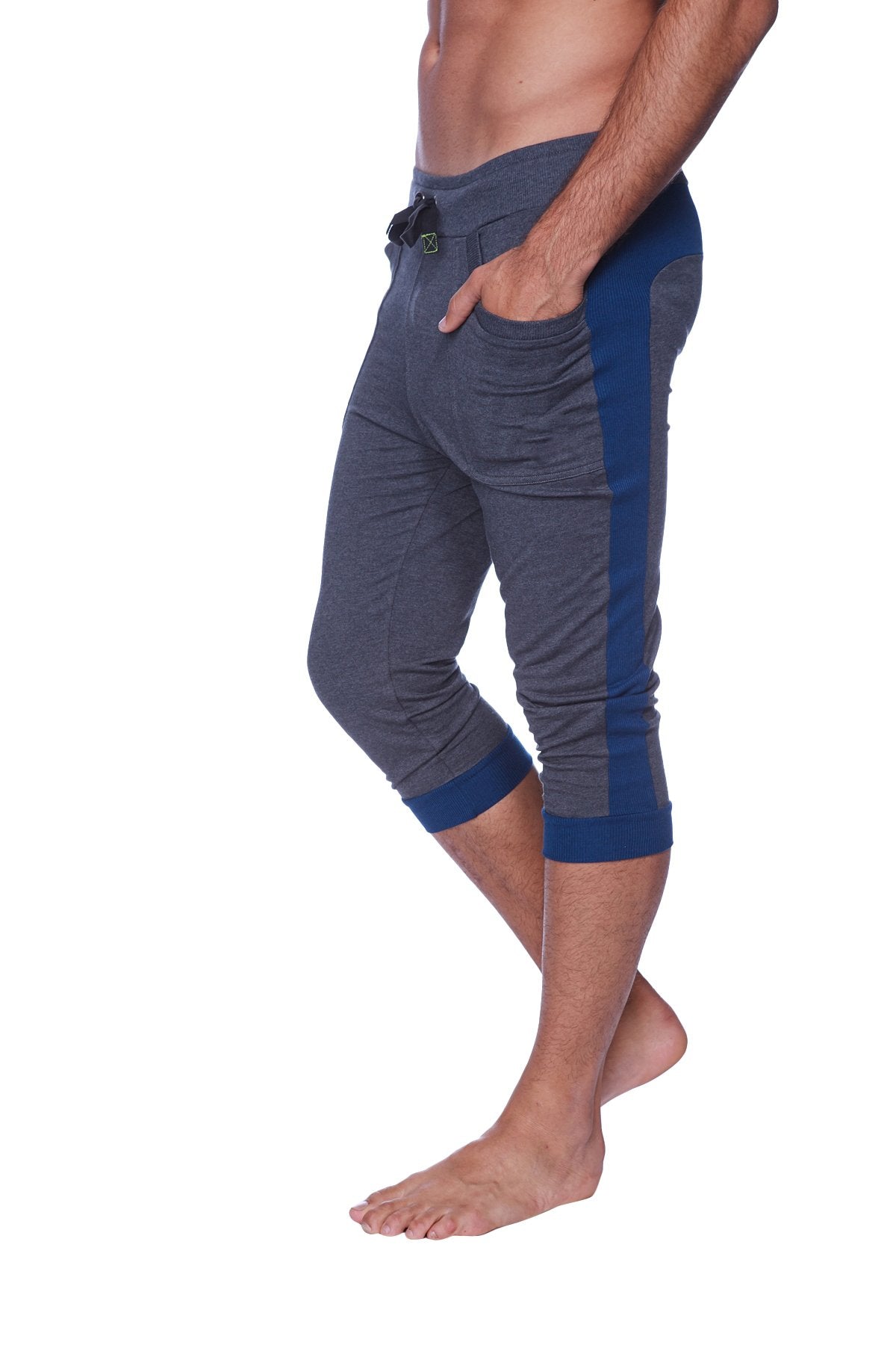 Mens cuffed yoga pants in charcoal with royal blue featuring drawstring waistband side pockets and ribbed cuffs