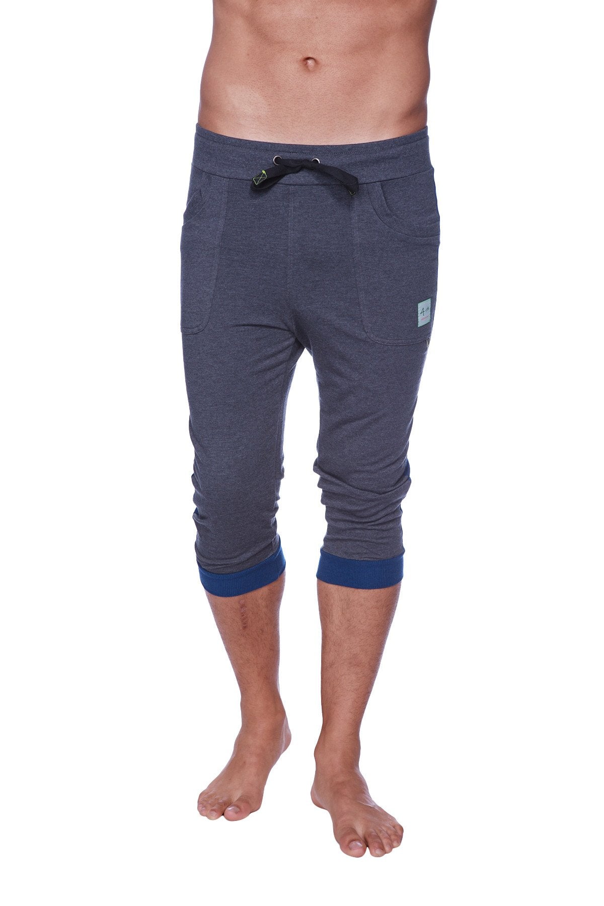 Men’s cuffed yoga pants in dark gray heather with navy blue waistband trim and cuffs for comfortable activewear