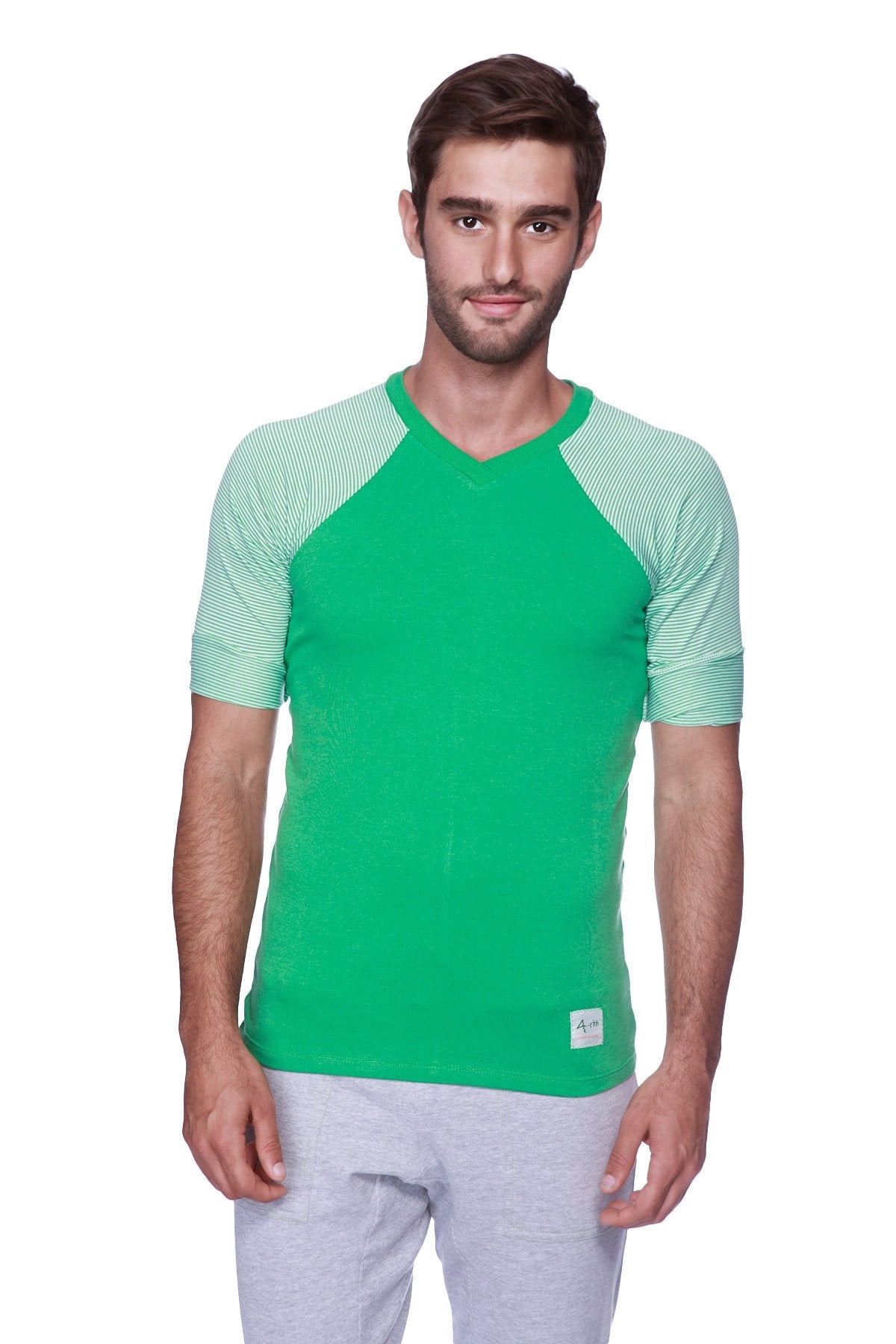 Green v-neck t-shirt with light green striped raglan sleeves paired with heather grey mens cuffed yoga pants with green