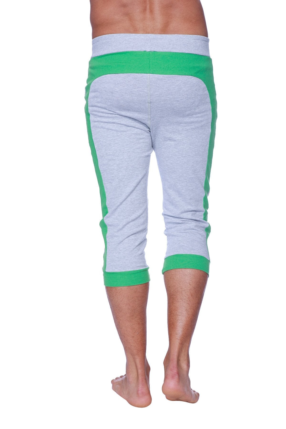 Mens cuffed yoga pants in heather grey with green accents featuring ribbed cuffs and waistband in capri length