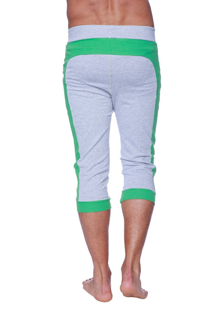 Mens cuffed yoga pants in heather grey with green accents featuring ribbed cuffs and waistband in capri length