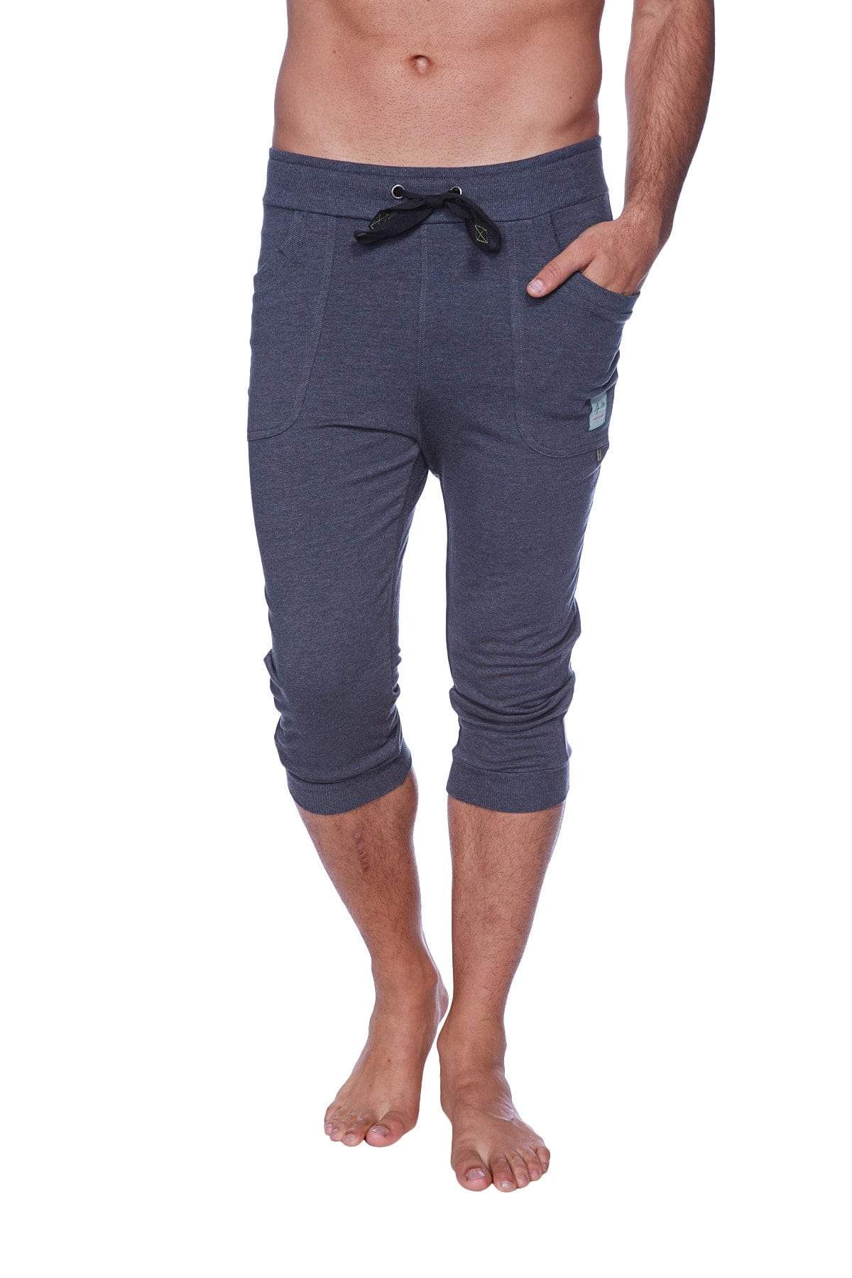 Men’s cuffed yoga pants in solid charcoal dark gray heathered fabric with black drawstring waistband and side pockets