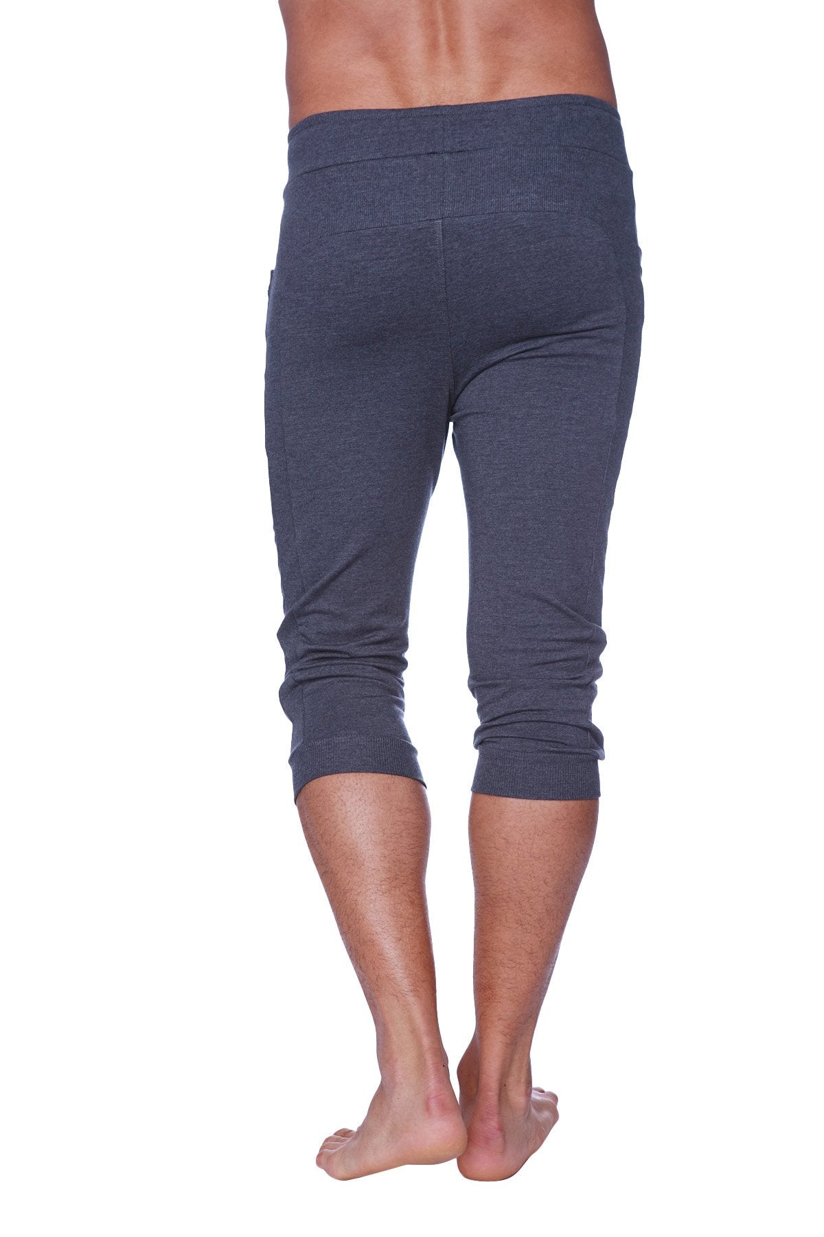 Dark gray stretchy mens cuffed yoga pants with high waistband and rolled cuffs in solid charcoal color