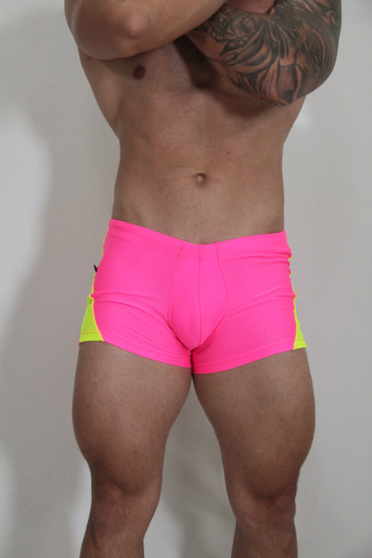 Neon curved sq cut trunk swim trunks in bright pink and neon yellow with a snug form-fitting design for athletic use