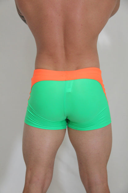 Neon curved sq cut trunk vibrant neon green and orange snug form-fitting athletic shorts for active wear