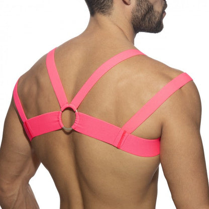 Bright pink elastic strap harness with central circular ring neon multi band harness for fashion or layering