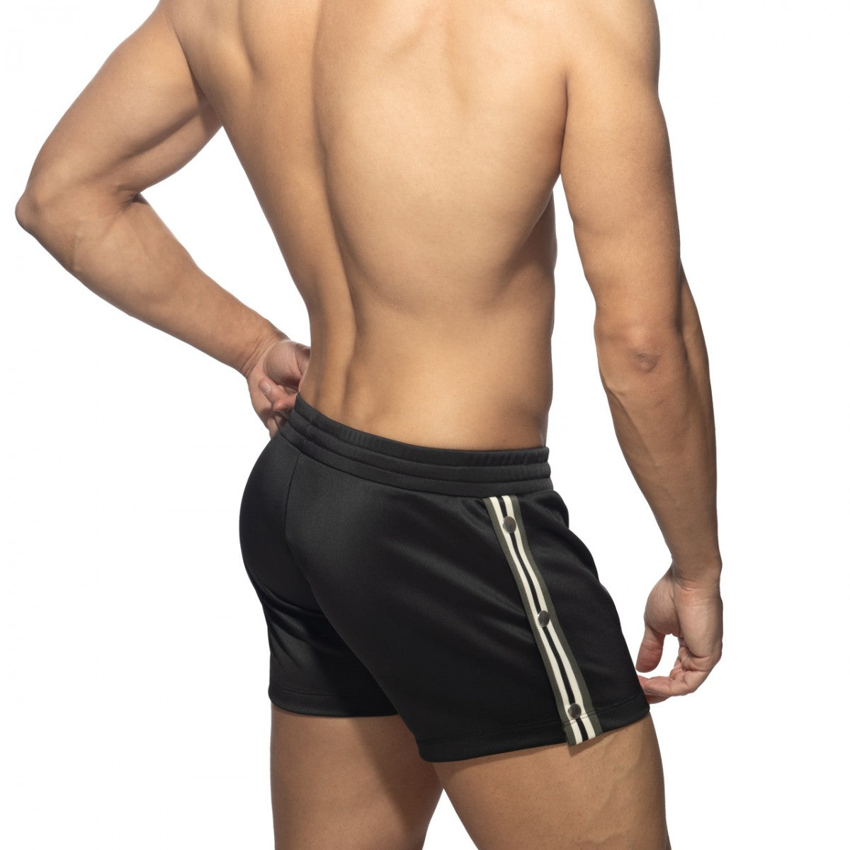 Black nexus button shorts with white and gray striped side panel designed for athletic use