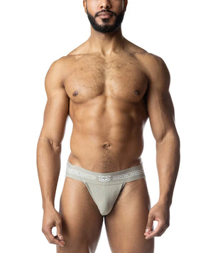 Sage green and white jockstrap with elastic waistband featuring repeated text and a center logo.