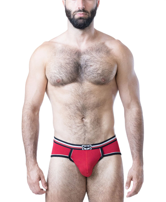 Red U-front brief with black and white trim featuring a comfortable fit modeled by a man with a muscular build by Nasty Pig