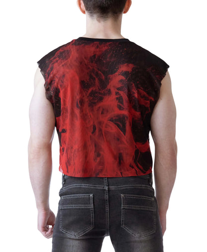Model wearing a sleeveless crop top with a flame design in red and black paired with dark jeans by Nasty Pig