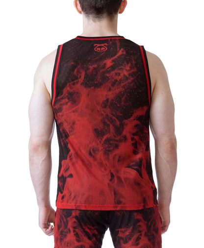 A model wearing a red and black tank top with a flame pattern featuring a mesh material and the Nasty Pig logo on the back