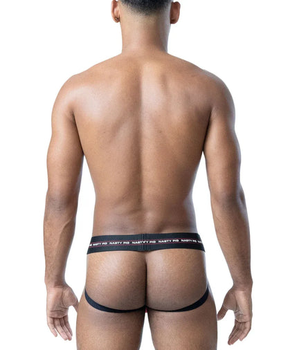 Black mesh jockstrap with red and white logo waistband worn by a model from the back showcasing a sleek design by Nasty Pig