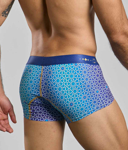 Blue and purple geometric patterned men’s boxer briefs with navy waistband from new malebasics trunk hipster collection