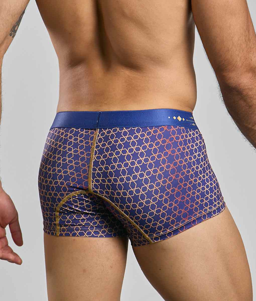 New malebasics trunk hipster men’s boxer briefs in blue and gold geometric pattern with solid blue waistband