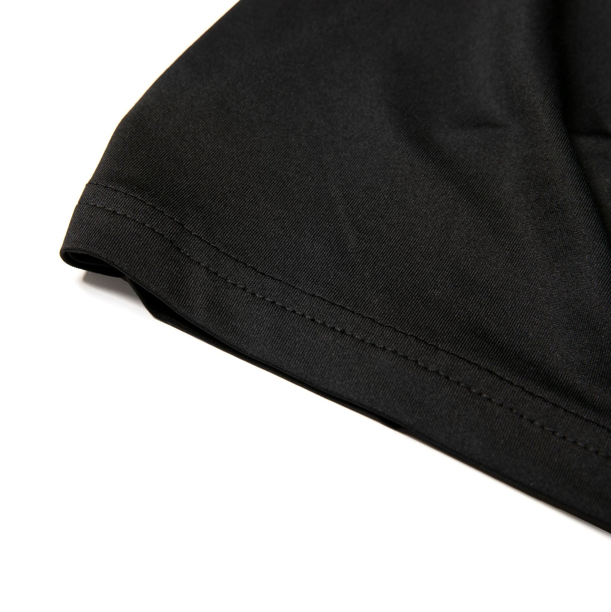Black nylon active tank top sleeve with neatly stitched hem made for comfortable activewear use
