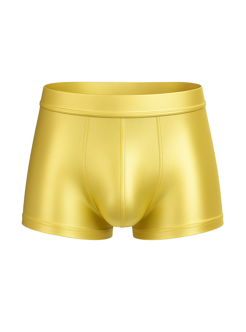 Shiny gold metallic nylon luxury trunk briefs with a smooth reflective surface and a snug fitting design