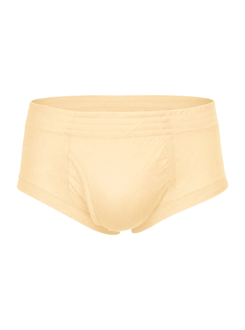 Beige nylon tricot brief with smooth seamless design and elastic waistband for comfortable everyday wear