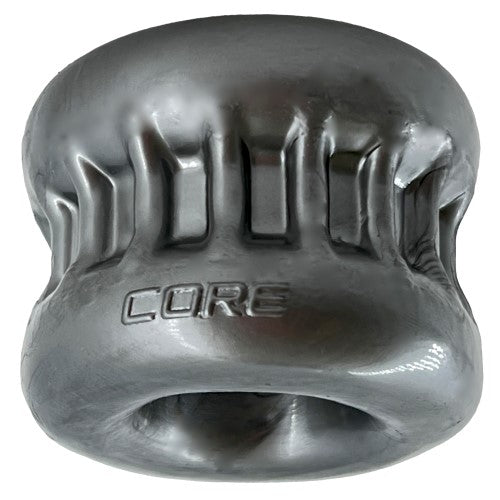 Metallic silver OXBALLS Core ball stretcher with fluted sides and the word "CORE" embossed on the front.