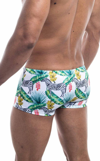 Oceanico square cut white swim trunks with a vibrant tropical pattern of black and white zebras green palm leaves and flowers