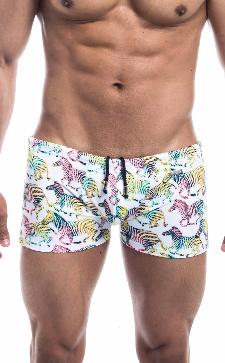 White oceanico square cut swim trunks with vibrant multicolored zebra pattern and black drawstrings