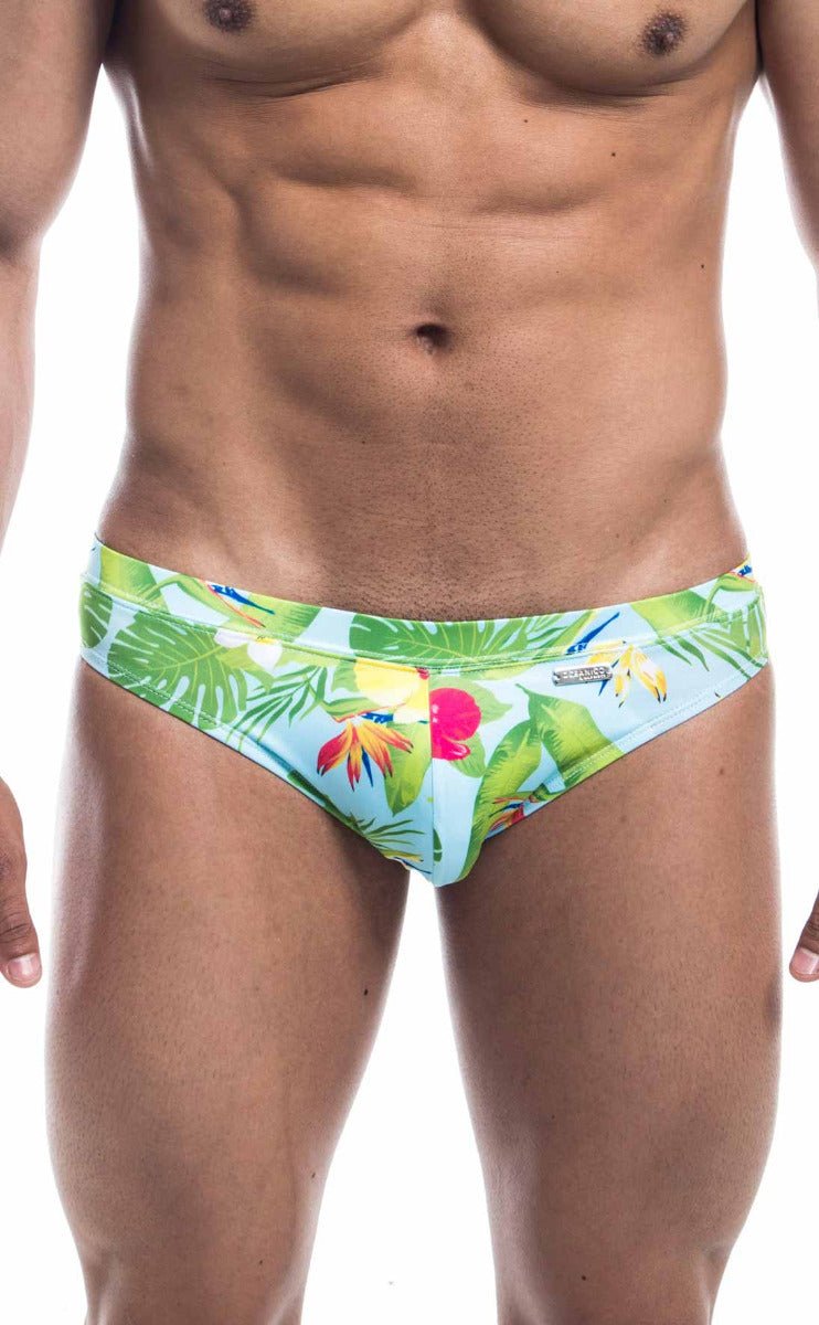 Oceanico swim bikini vibrant tropical print swim trunks in light blue green and pink with bold leaf and flower design