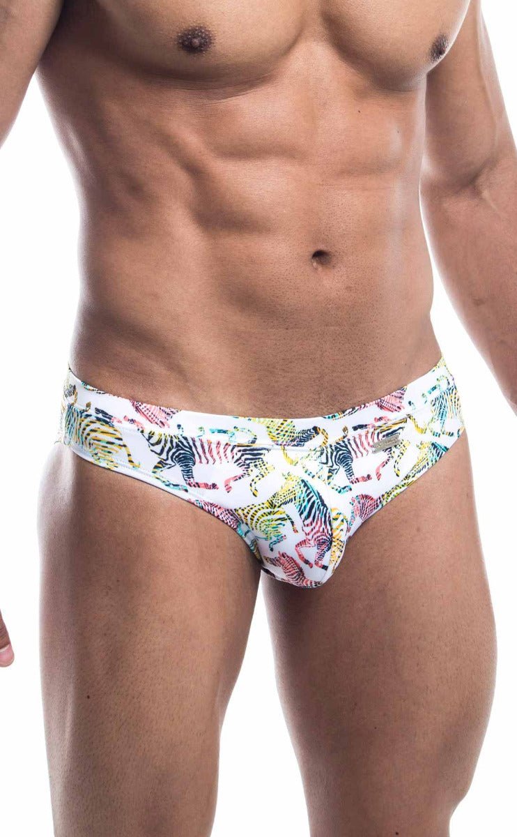 Oceanico swim bikini white swim trunks with vibrant multicolored zebra pattern in pink blue green and yellow stripes