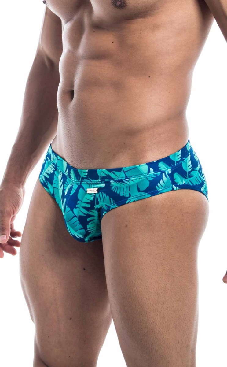 Oceanico swim bikini blue trunks with vibrant tropical teal and turquoise leaf pattern perfect for beachwear