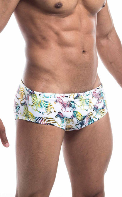 White Oceanico swim brief with vibrant multicolored zebra print pattern ideal for beach and pool use