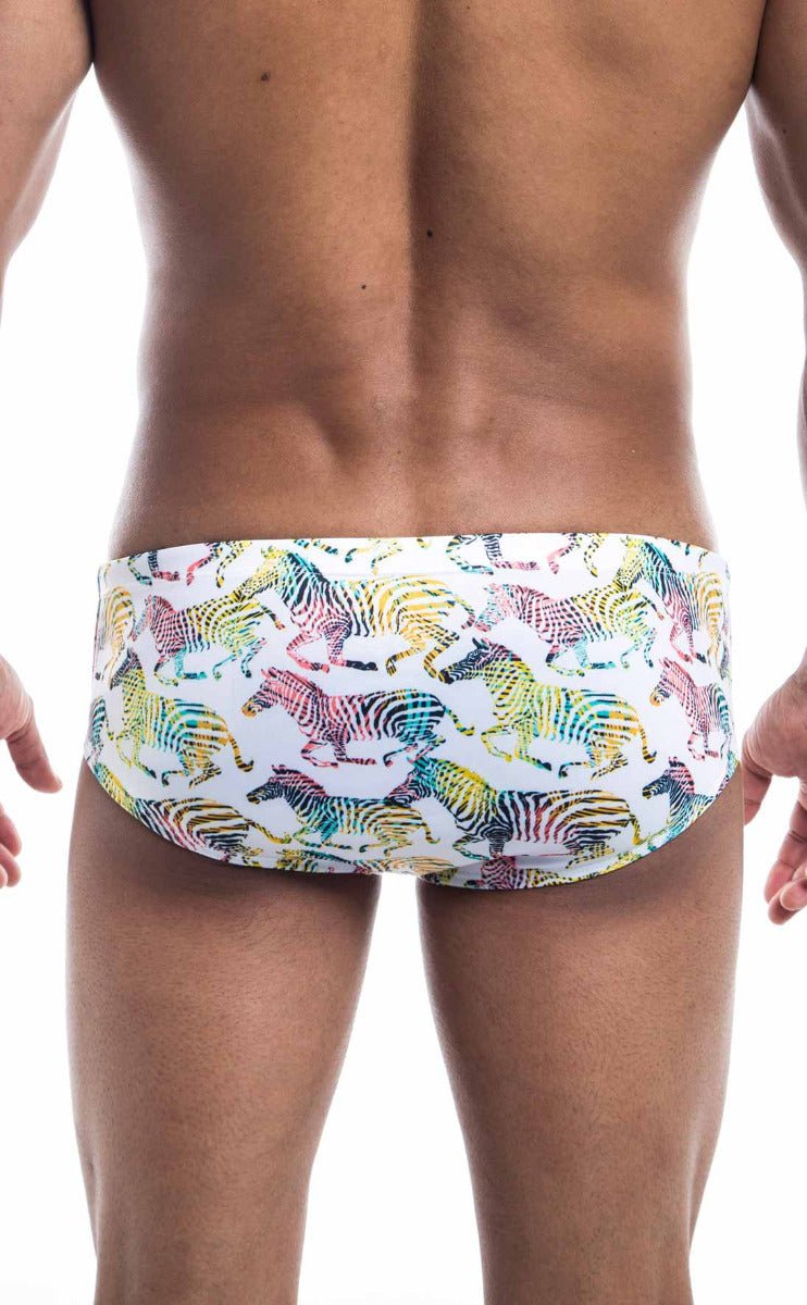 White swim trunks oceanico swim brief with vibrant rainbow zebra pattern perfect for beachwear