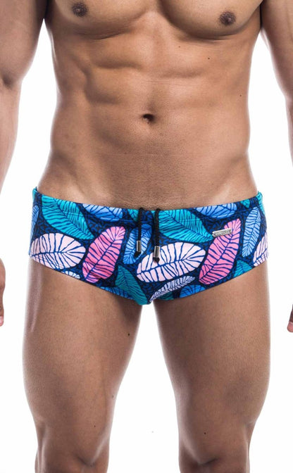 Oceanico swim brief featuring blue and pink tropical leaf patterned swim trunks with a black drawstring