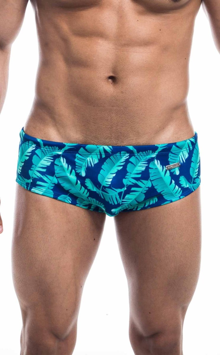 Oceanico swim brief in blue with vibrant turquoise tropical leaf pattern for stylish beachwear