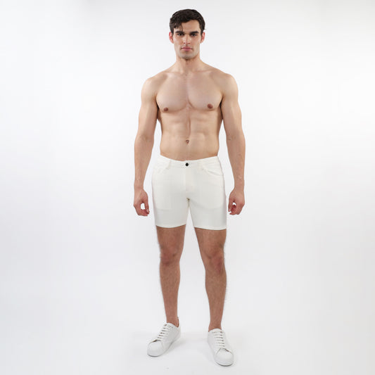 White parquet jacquard stretch knit athletic shorts with sleek minimalist design and single black button waistband