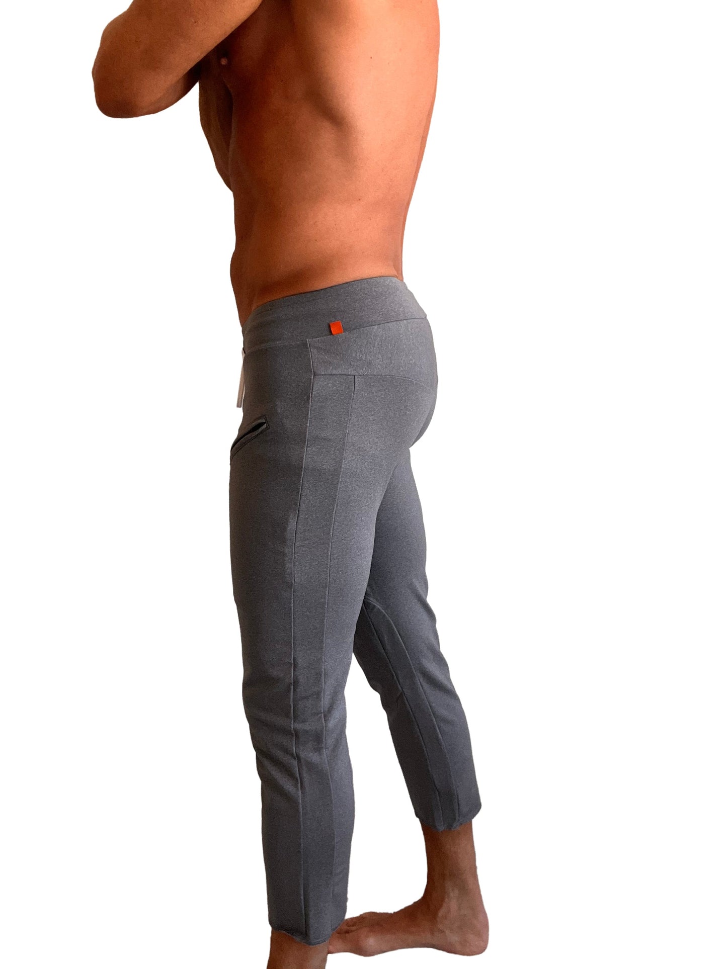 Performance premium mens dark grey heather capri yoga pants with zipper pockets and sleek textured fabric