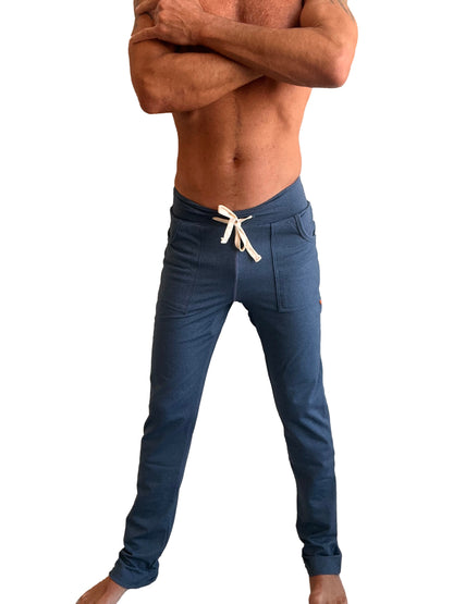 Navy blue performance premium long cuffed jogger with white drawstring waistband and two front pockets for yoga and athletic use