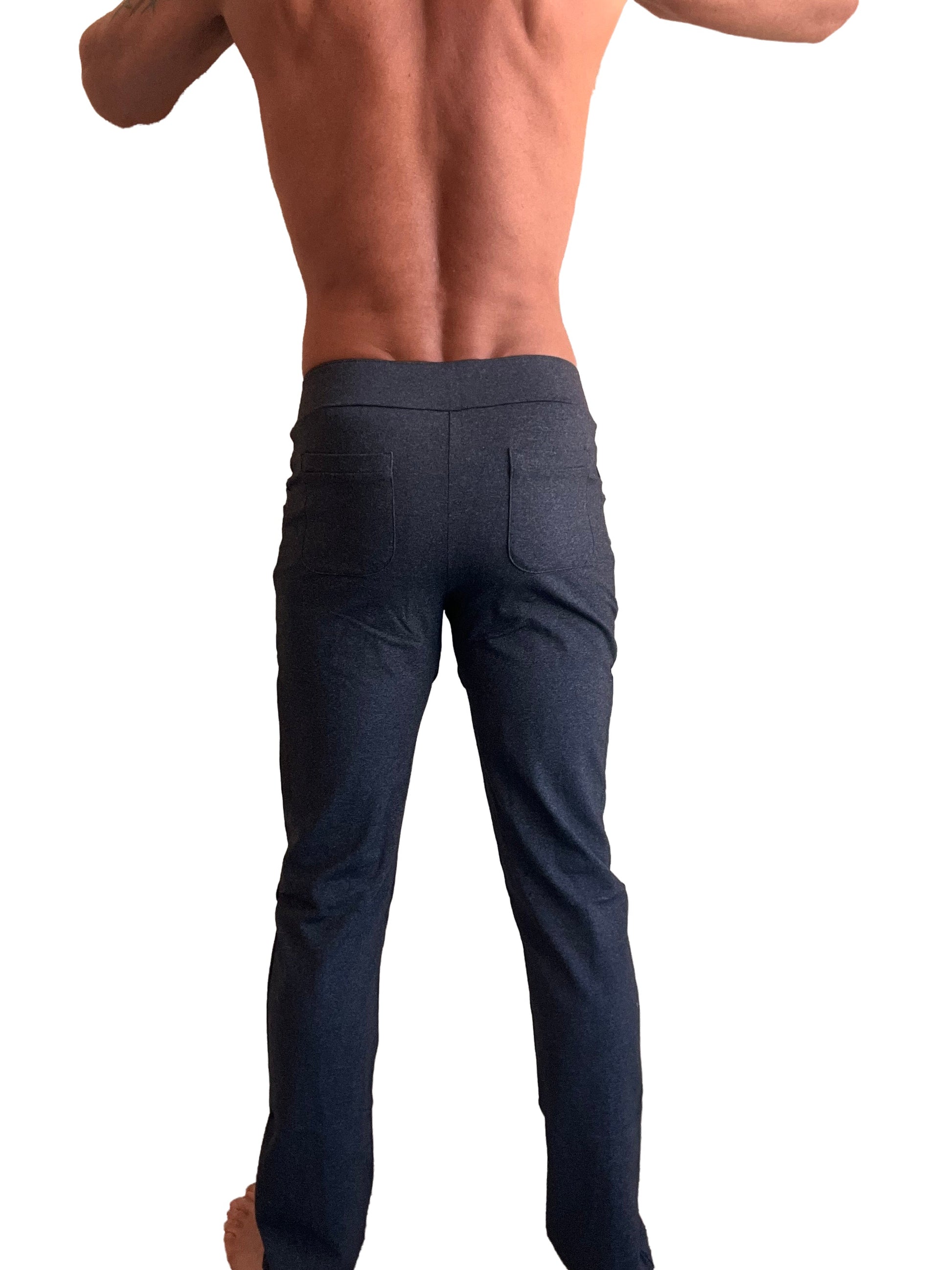 Dark blue slim-fit performance tactical urban dress trousers with subtle texture and two rear pockets back view