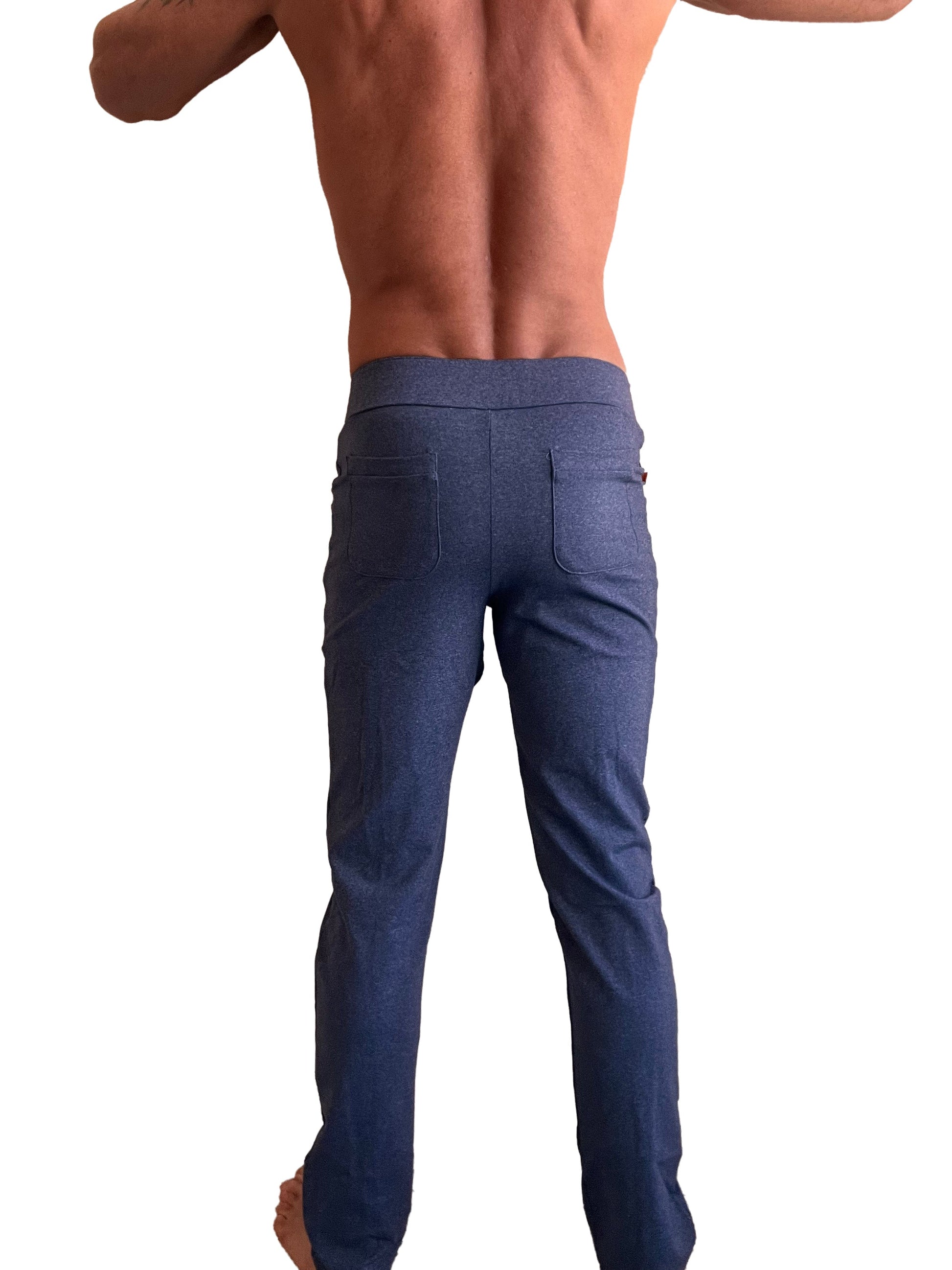 Back side of performance premium tactical urban dress pant yoga pant in navy blue heather with slim fit denim fabric and two pockets