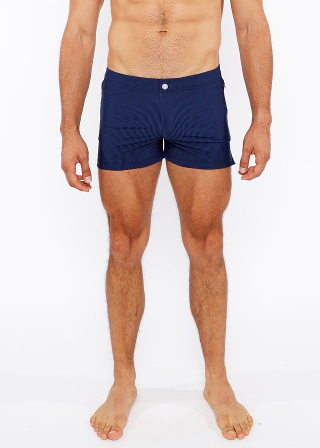 Navy blue pinstripe swim short with white button closure designed for comfortable beach and poolwear