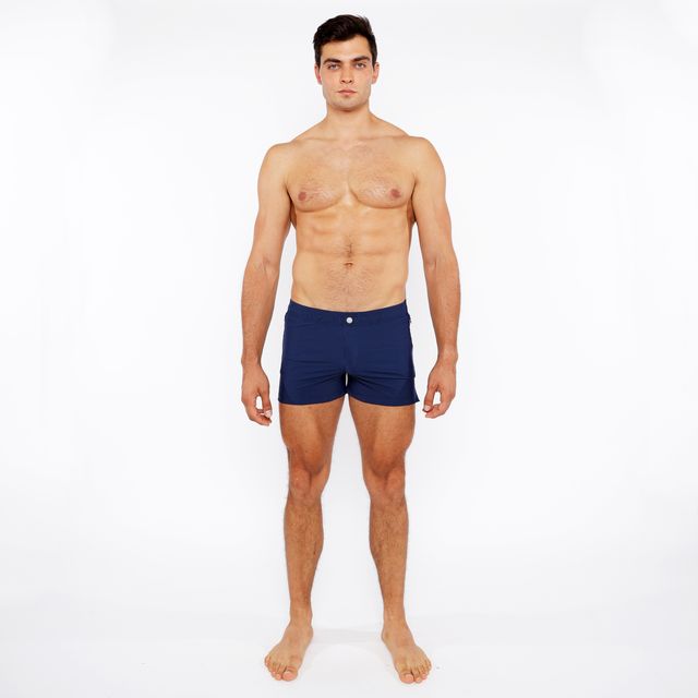 Navy blue pinstripe swim short with a single white button at the waistband for beach and pool use
