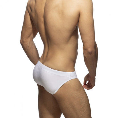 White cotton piqué speedo briefs showing the back side with breathable textured fabric design
