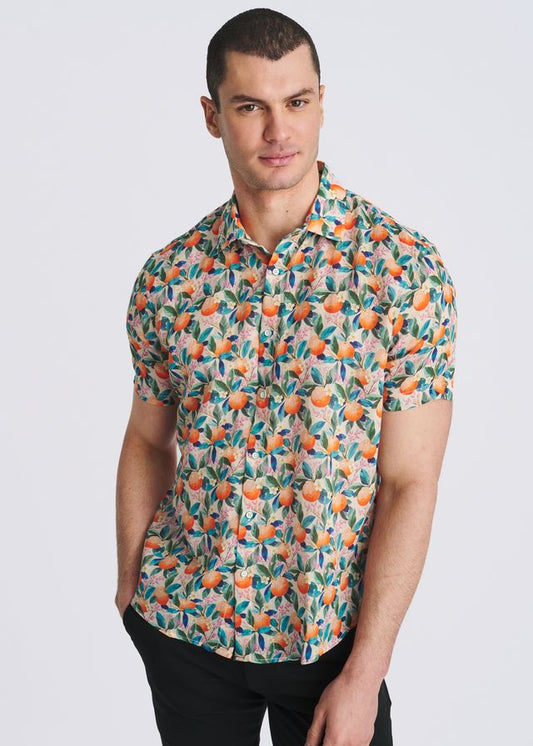 Short-sleeve button-down shirt featuring an all-over print of orange fruits and teal leaves on a light background.
