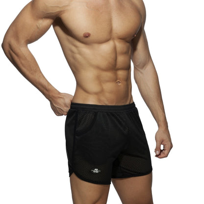 Black mesh pocket long mesh rocky athletic shorts with subtle logo on lower left leg for sports and workouts