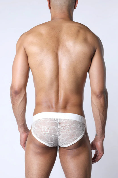 White lace positano bikini brief with delicate floral pattern and solid white waistband for comfortable wear