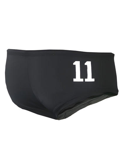 Black pride justin brief swim trunks with white number 11 printed on the front for athletic use