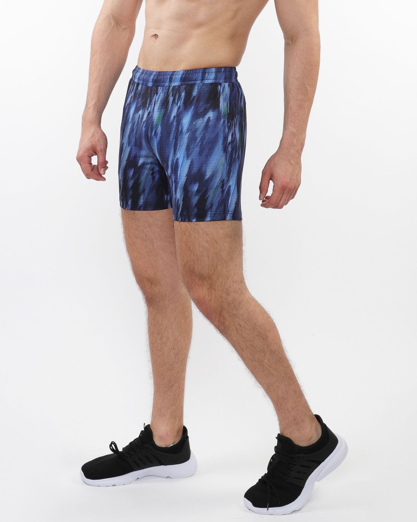 Printed mesh stretch performance shorts in blue and black with an abstract athletic pattern for active wear