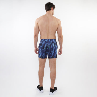 Printed mesh stretch performance shorts in blue with abstract pattern and fitted waistband for athletic use