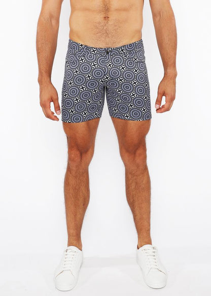 Printed stretch knit short in navy blue with white geometric pattern made from stretchy knit fabric for men