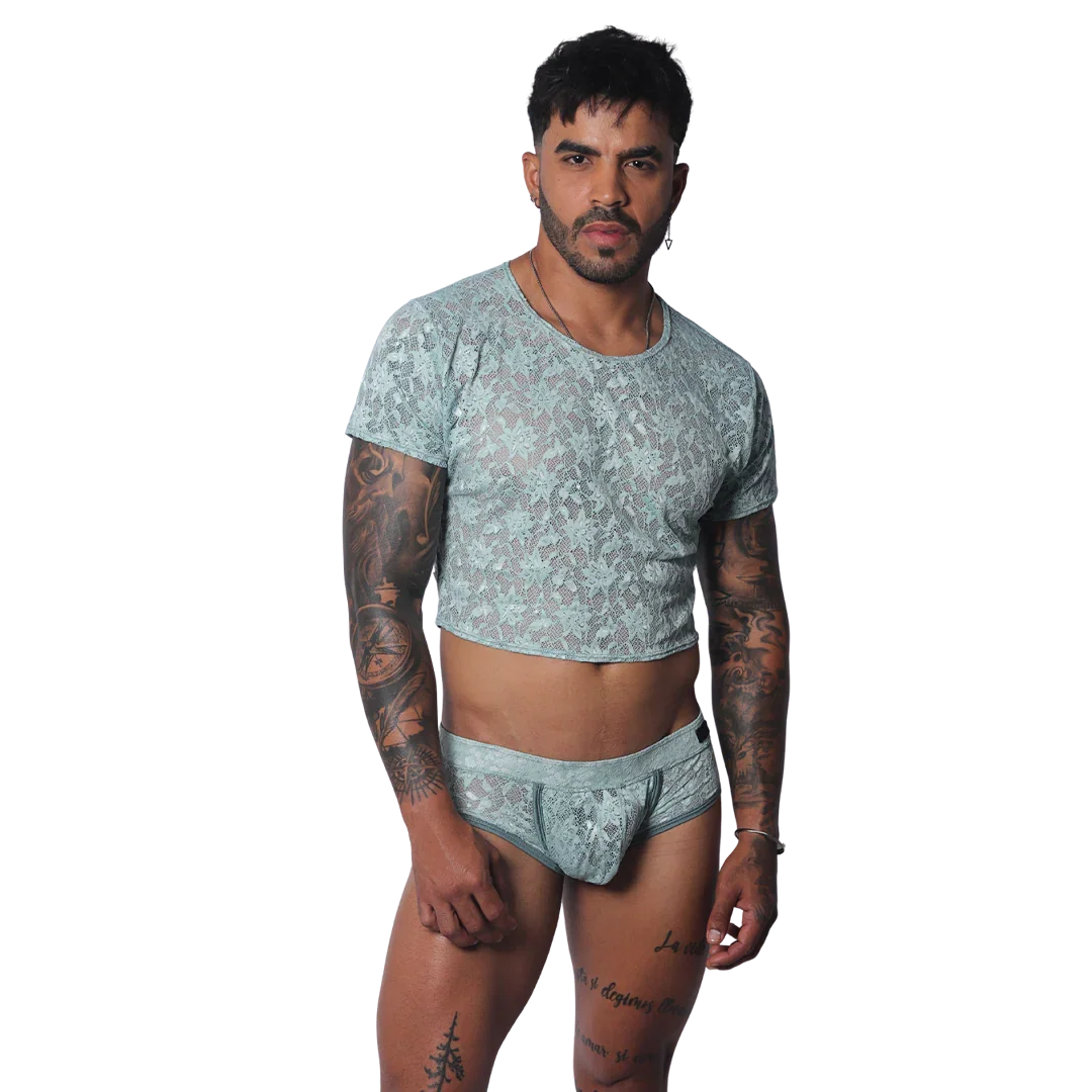 Aqua green short-sleeve crop top in a sheer, floral lace material with a round neckline and cropped hem.